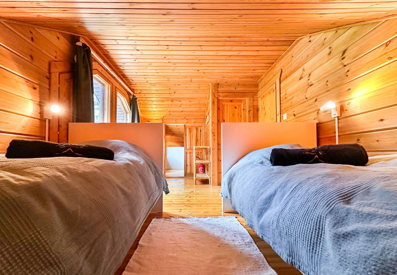 Chambre avec deux lits